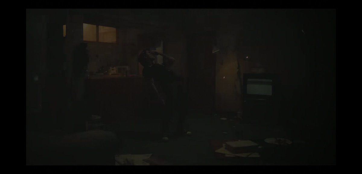 The living room it's the most confusing place in the MV it's in disorder and might represent IAN's mind