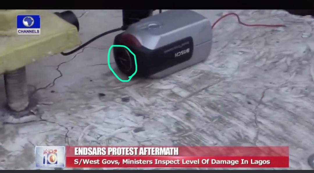 Now notice the challenge, why is a camera that may have allegedly recorded the series of events have a closed lens cap? Any security experts to help?  #EndSARS  