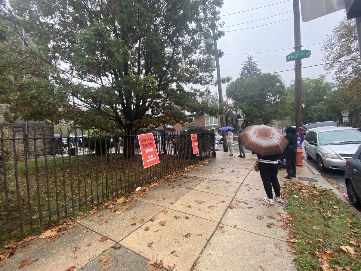 Early voting line goes around the block at Overbrook Elementary School on a rainy Monday in Philly. Some have been here since 9:30 a.m. The site opens at 11:30.