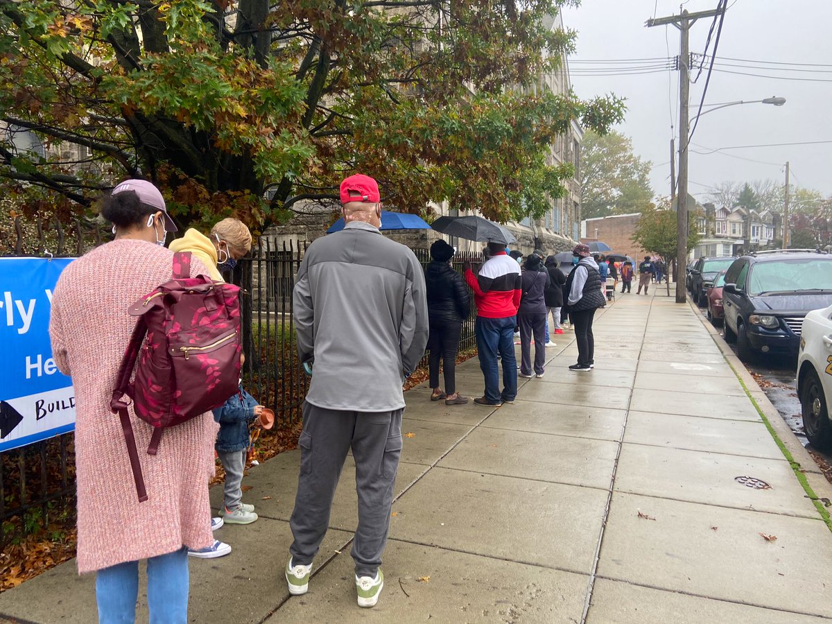 Early voting line goes around the block at Overbrook Elementary School on a rainy Monday in Philly. Some have been here since 9:30 a.m. The site opens at 11:30.