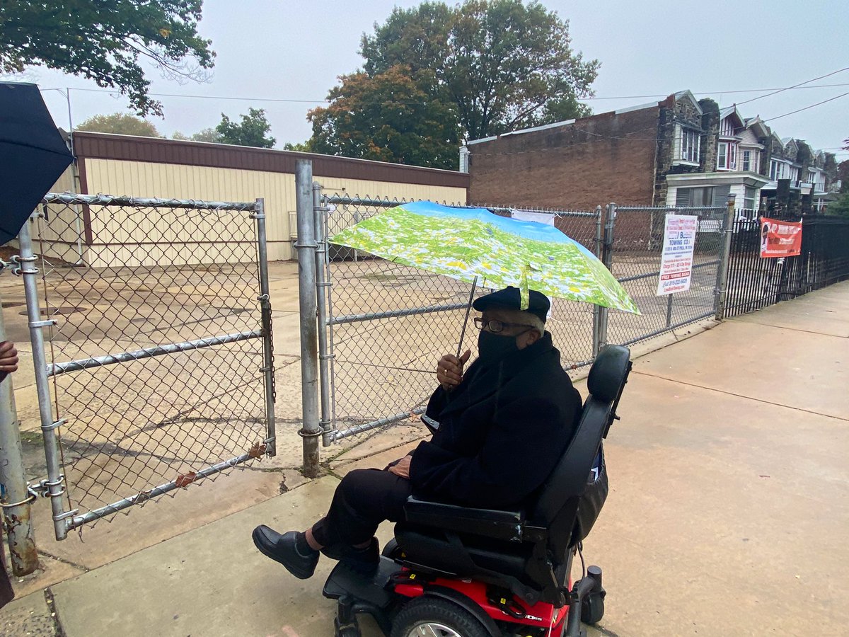 Many have folding chairs, prepared for a wait. The first person in line is Charles Boston, who'll turn 86 in December. His aide drove him here shortly after 9 a.m. He said his vote for Biden will be the most important he'll cast in his lifetime. "The country is in turmoil."