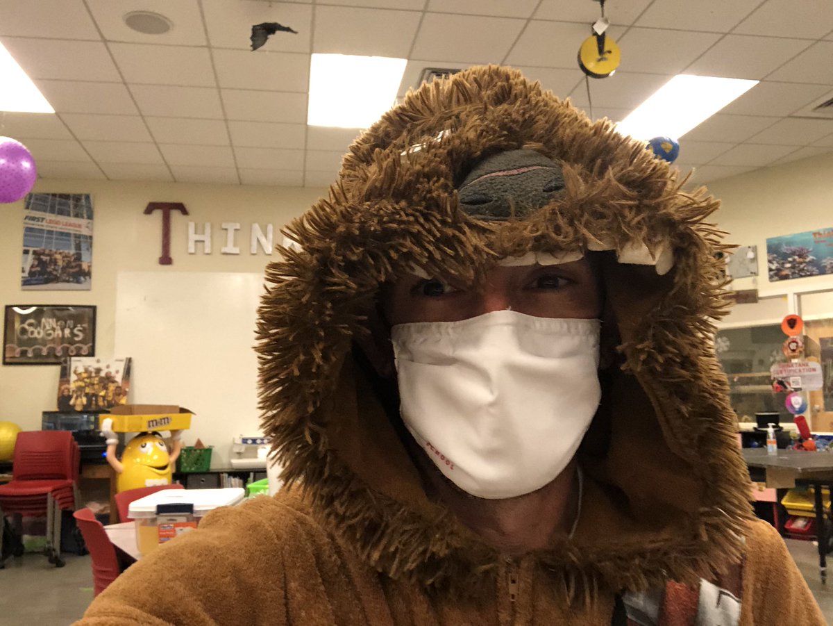 Pajama day <a href="/CannonMiddle/">Cannon Middle School</a> for spirit week. Trying to figure out what #mask looks best with my #wookie onesie.  #starwars