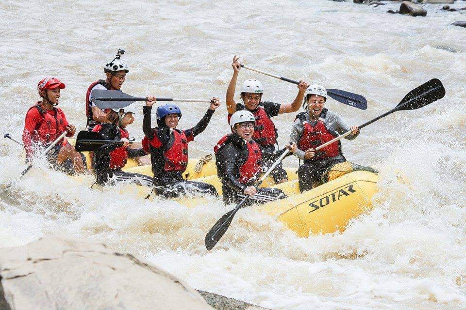 So my mum started helping taking pictures of rafters when my dad goes rafting with the tourists Like this! That's my dad at the end of the raft, with the white helmet. This picture was taken in 2010, but the picture my mum used to take was sumthin like this.