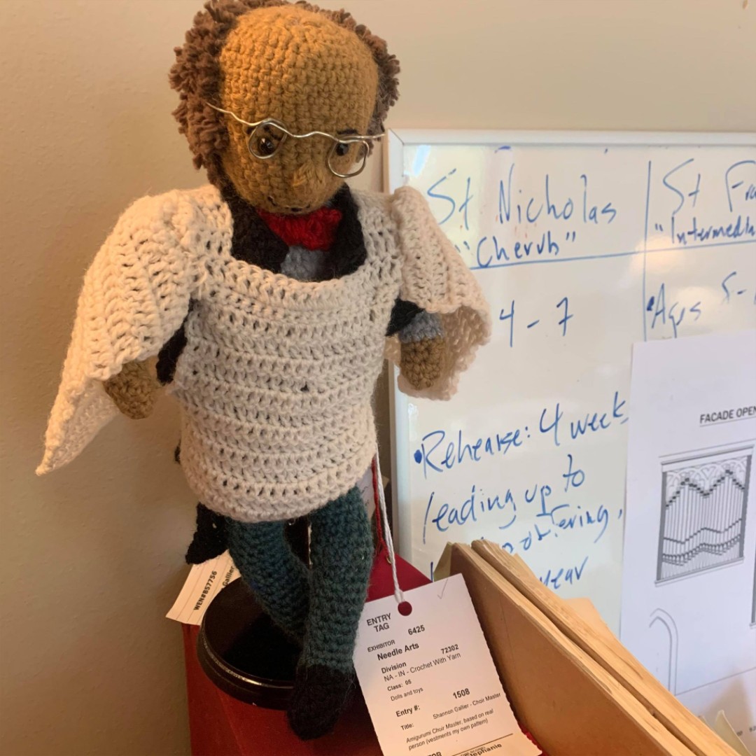 Our Director of Music, Shannon Gallier, has a mini-me that helps him keep an eye on office troublemakers when he's out educating our small-group choir sessions. Just look at that stare!