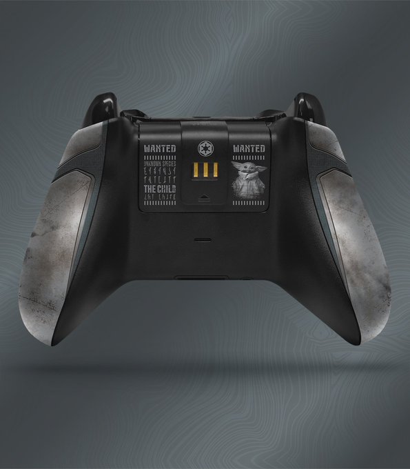 The back of the Controller Gear Mandalorian Wireless Xbox Controller & Xbox Pro Charging Stand Set sits in front of a silver background.