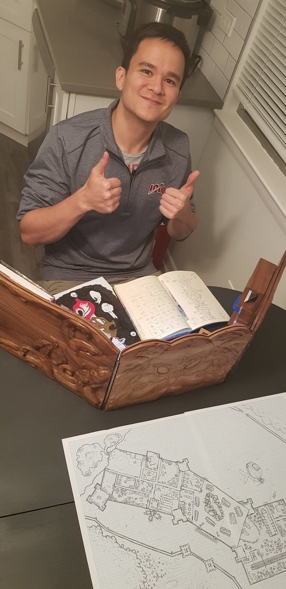 SagaEventsinc's tweet photo. The #SagaForgeScribe #Halloween contest is coming to an end. Winner &amp; author of Isrodel - The Roving House just received this beautiful DM screen &amp; we're happy to see it in use! 

Thank you for sponsoring such an amazing prize @ChickenlyNerd.

#dnd #Dungeonmaster #adventurewriter https://t.co/0YFka7W4Zh