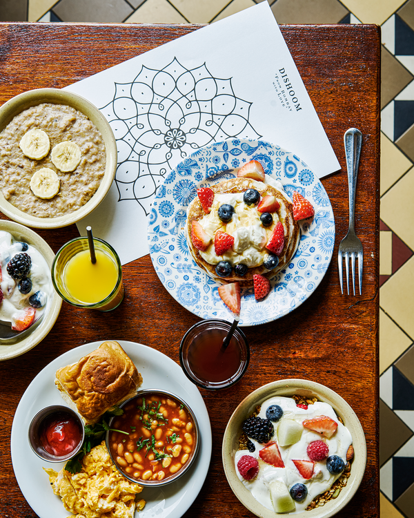 Dishoom's tweet photo. Parents, we have a half-term highlight for you, by way of a new and brimming Children's breakfast. Most important little guests can enjoy chote (small) versions of our Bombay breakfast, Uttapam Stack, Oat Milk Porridge and more. Art materials also happily provided. https://t.co/eEdTLZ2nBD