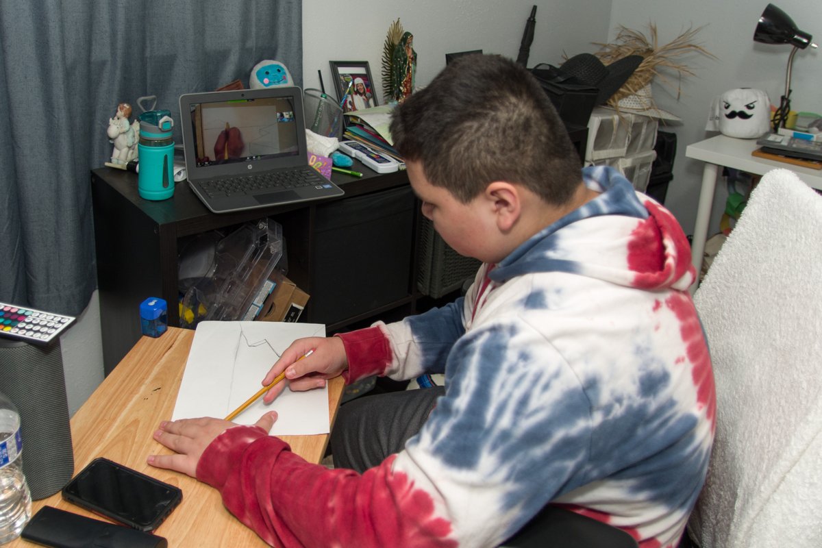 HighlineSchools's tweet photo. Issac is a 6th grade student at Chinook Middle School. Here he is in art class via Zoom. His mom is taking the district device in for repair, so he can submit his homework, but things are going surprisingly well. Read more: https://t.co/mNVEBJAw8U
#techlevy2020 #OurHighlineStory https://t.co/usqZOq3Qz8