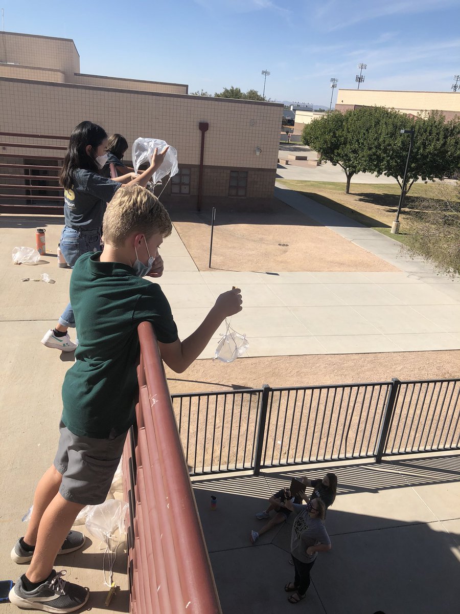 Does mass or surface area have a greater affect on the acceleration of falling objects?