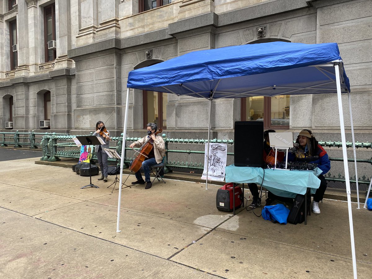 PEMammen's tweet photo. Hi Rep @AOC,
#SwingState voter here. Just spent 3.5 hrs in line on a misty cold day to vote early. Luckily #PhillySpirit kept me cozy w DJs, cellists/violinists, art & snacks.
Here’s hoping our #CivicDedication is stronger than #disenfranchisement.
#StayStrong #VOTE 💪🏽 https://t.co/kkJXTLWSaP