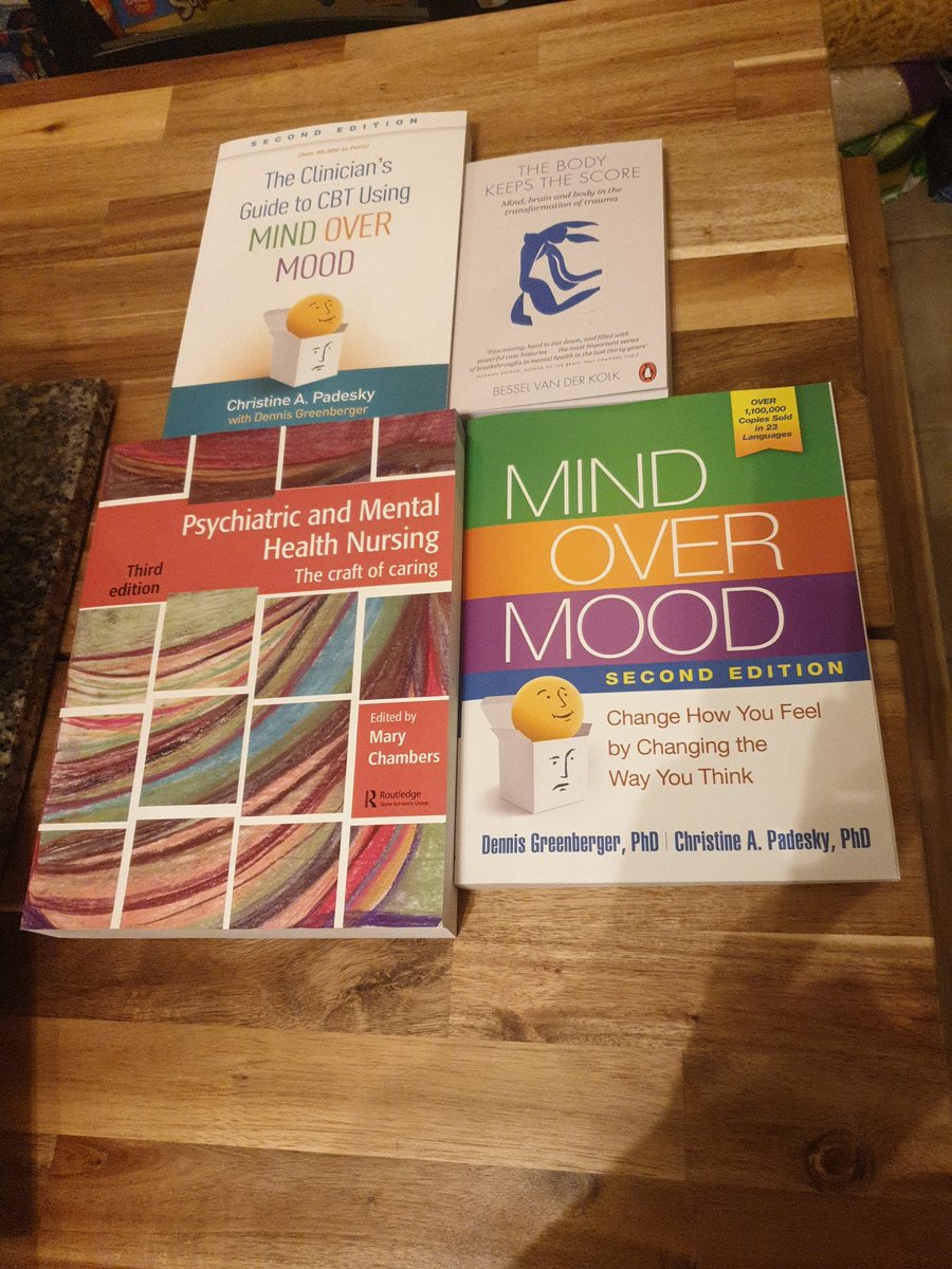 Stevie_SNurse's tweet photo. Just came home from my bank shift to more books. 
I've ordered soo many in the last few weeks. 
Lots of money but it will be worth it to have my own resources to study and refer to.🤞

Also heres our smiley cat, shes far too cute to not post this pic!
#Studentnurse
#Kitthecat https://t.co/J6DfiB411O
