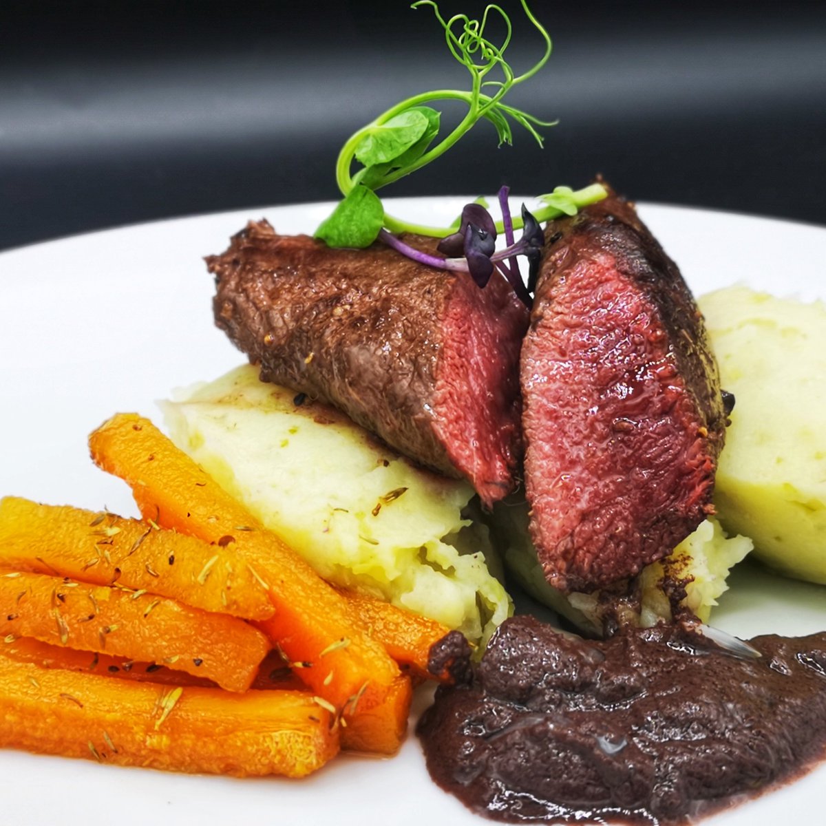 RoadkillChef's tweet photo. Rare Saddle of North Yorkshire hare with parmesan colcanon potatoe mash , carrot batons roasted in local honey and thyme with hare blood sauce garnished with pea and broccoli shoots #northyorkshire #wildgame #chef #hunting #outdoorsman https://t.co/i1g5JYyDxp