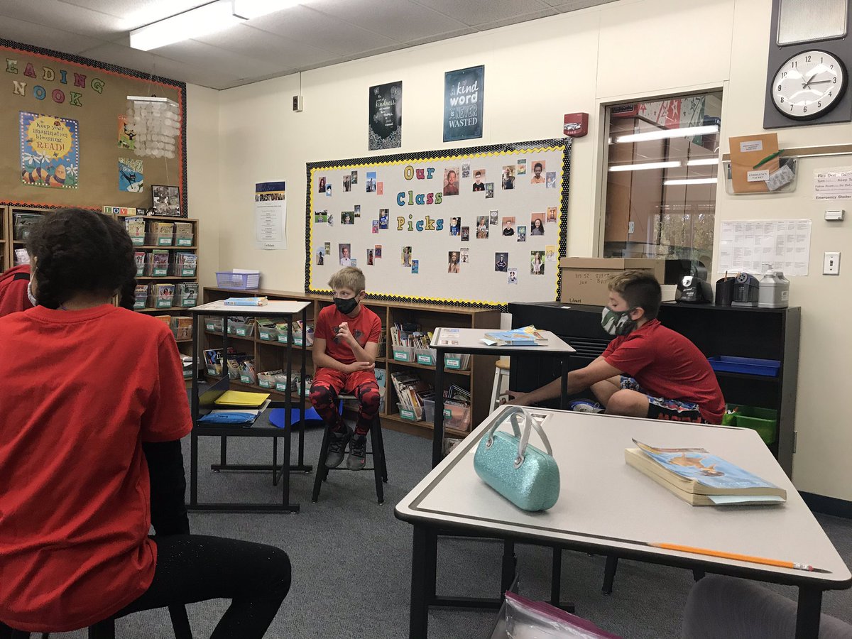 These fifth graders are dressed in red and having some thoughtful conversations about a shared text. ❤️ 🎀