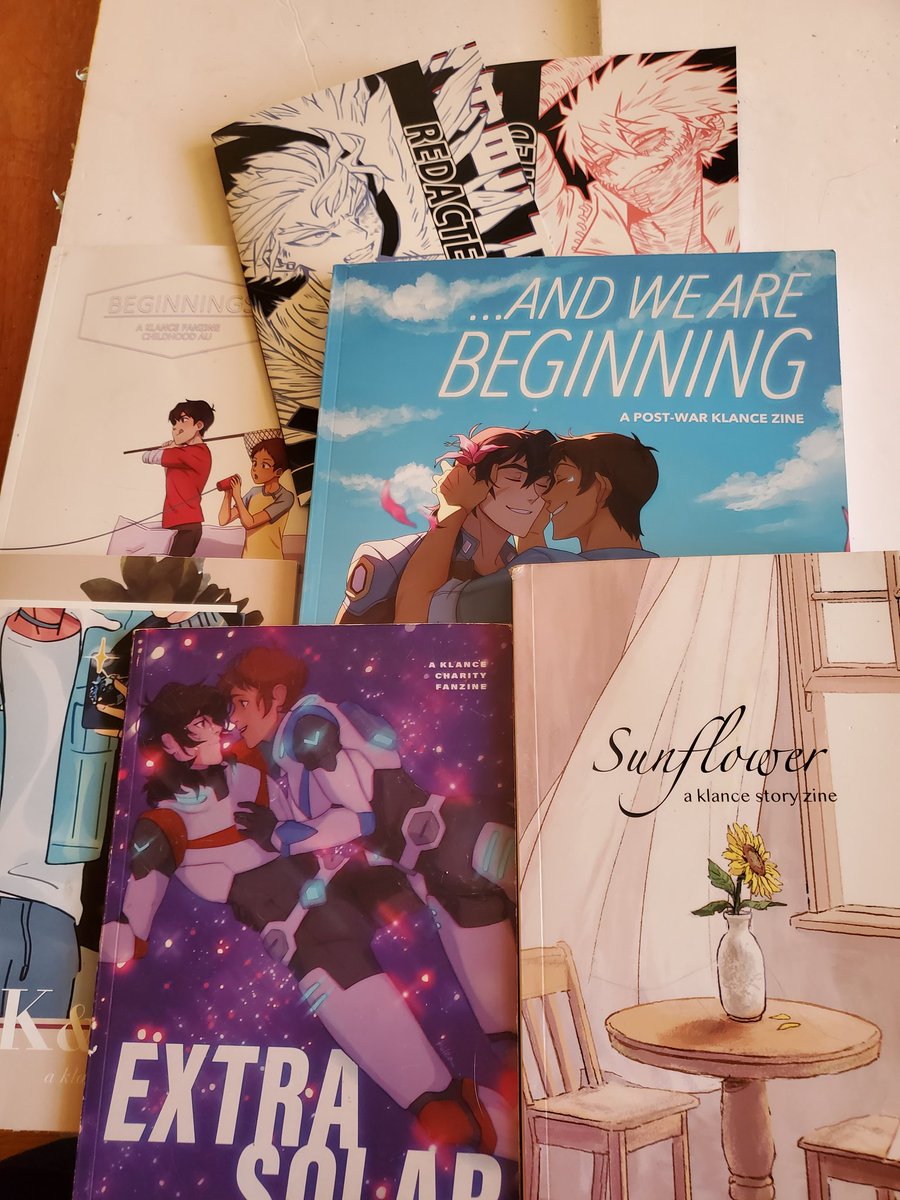 LustnLimerence's tweet photo. I finally got zines that weren't Klance related to add to me collection. Cheers, @RedactedWings https://t.co/JI83rZRszc