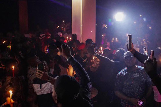 Naijablogger's tweet photo. Candle light session held in Bali, Indonesia for victims of the Lekki toll gate #EndSARS  peaceful protesters "shot by soldiers" in Lagos. https://t.co/b5okSBMORy