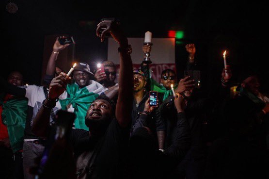 Naijablogger's tweet photo. Candle light session held in Bali, Indonesia for victims of the Lekki toll gate #EndSARS  peaceful protesters "shot by soldiers" in Lagos. https://t.co/b5okSBMORy