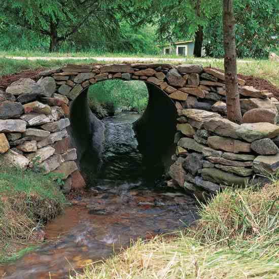 MotherEarthNews's tweet photo. Learn how to build a stone culvert with dry-stacked and flared wing walls to divert water. #stone #culvert #stoneculvert #drykstacked #flarewing #walls #MotherEarthNews https://t.co/n8jIxgsZFa https://t.co/8kSRiijUup