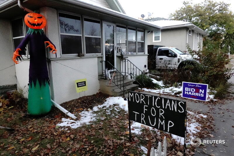 Reuters Pictures On Twitter A Morticians For Trump Sign Is Seen Next To Halloween Decorations And A Biden Harris Yard Sign In St Paul Minnesota More Images Across America As The Coronavirus Pandemic