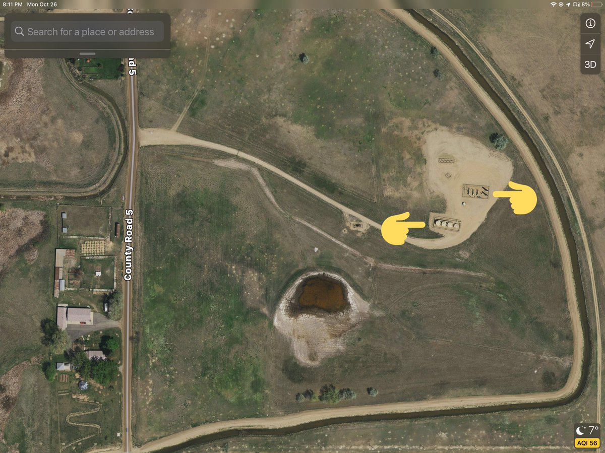 Short course in what fracking looks like: This is a couple of well heads and a storage container on private property in Weld County, CO.  points at storage,  point at wellheads.What the oil company leases is the access roads and the footage where the tank & pumps are.