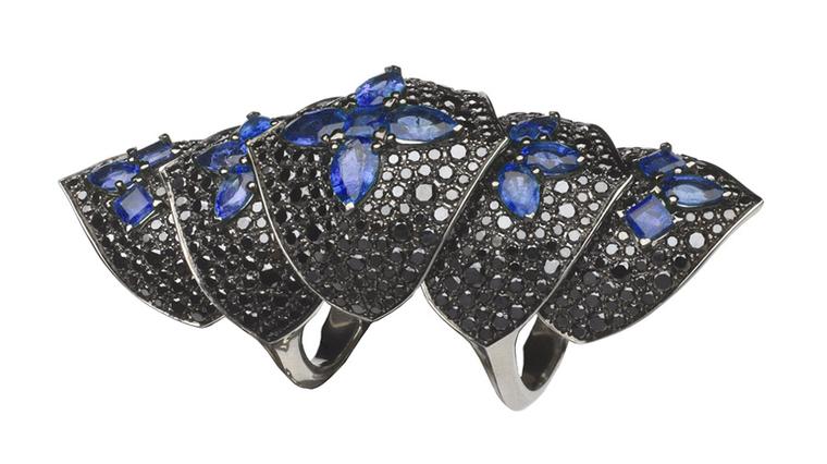 From Stephen Webster. Black diamonds and sapphires, a hinged ring he called the armor-dillo.