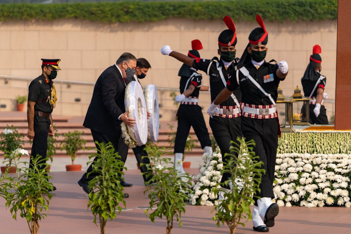 SecPompeo's tweet photo. A solemn moment laying a wreath at the National War Memorial in New Delhi with U.S. Secretary of Defense @EsperDoD. We will never forget the brave men and women who have given their lives in defense of the world’s largest democracy. https://t.co/xvwUdgSvlF