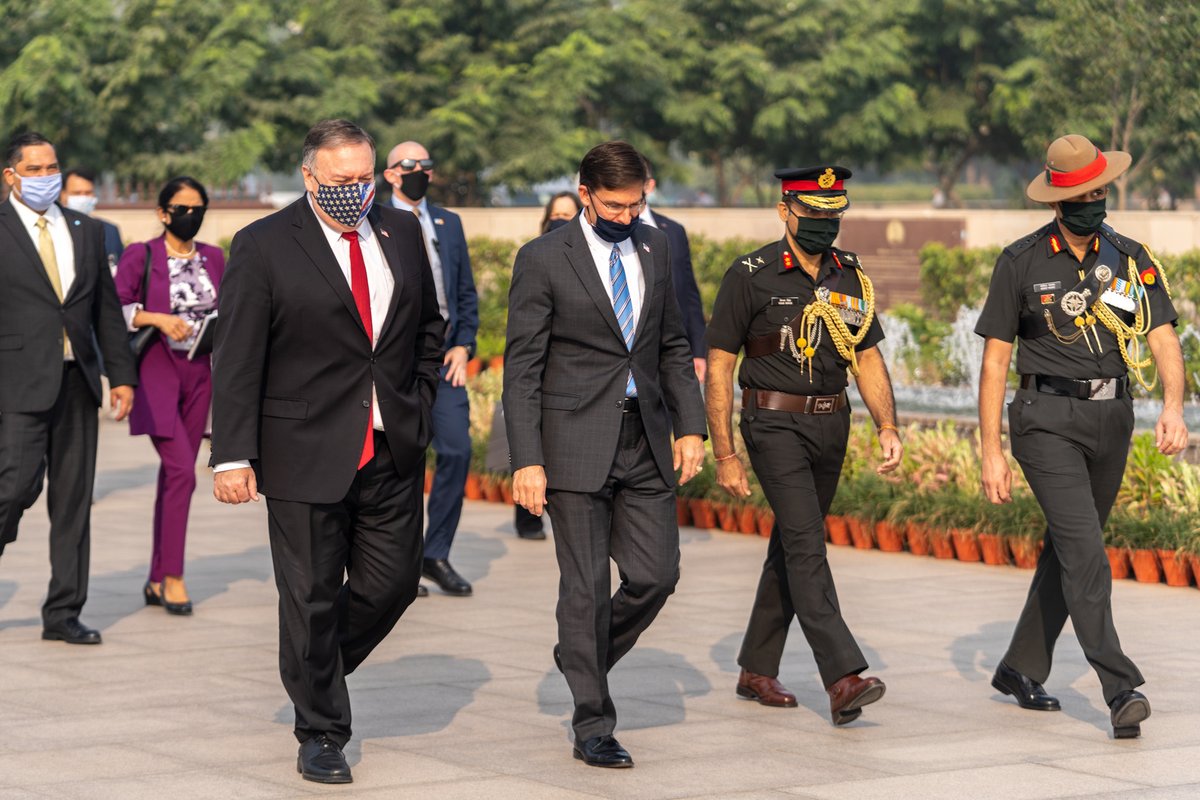 SecPompeo's tweet photo. A solemn moment laying a wreath at the National War Memorial in New Delhi with U.S. Secretary of Defense @EsperDoD. We will never forget the brave men and women who have given their lives in defense of the world’s largest democracy. https://t.co/xvwUdgSvlF