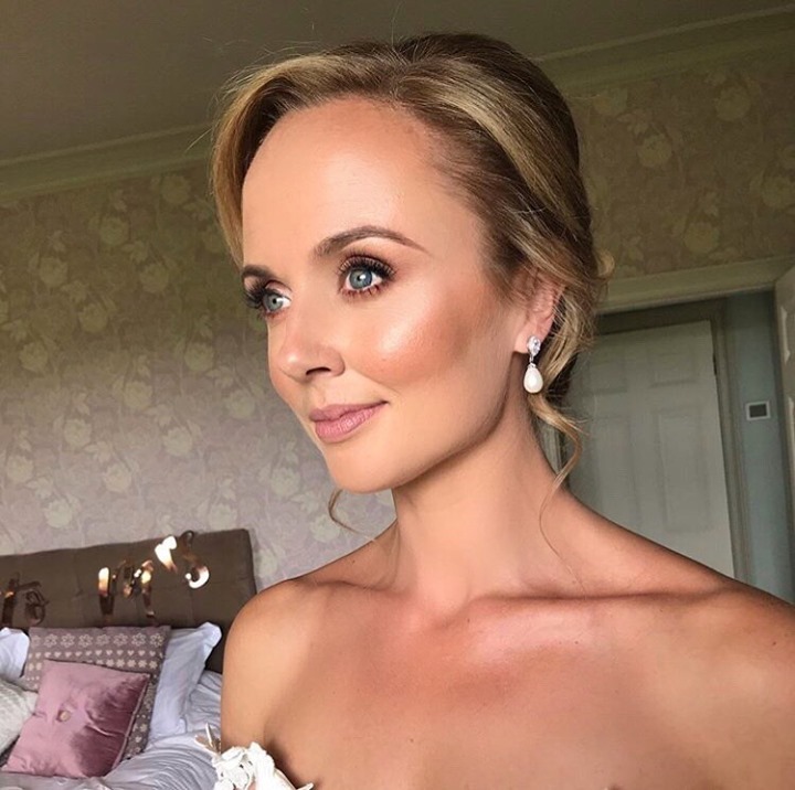 Stunning real bride jennyvwickham finishing her glowing bridal look with our luminescent pearl drop earrings ✨⁠
⁠
Makeup: jessiegmakeup ⁠
⁠
Style name: Ambrosia CZ and teardrop pearl earrings⁠
⁠
Use 'AMOUR' for 15% off, tap bio link to shop now! 💕⁠
⁠