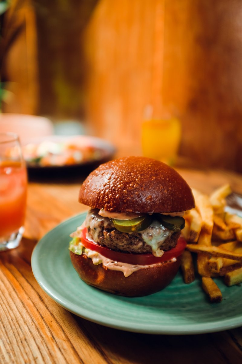 28 Day Aged Beef, Smoked Cheddar in a Brioche Bun from <a href="/thesnapery/">The Snapery</a>. Served with hand cut chips. STILL ONLY £10 on our AMAZING LUNCH DEAL till 4PM. KIDS under 10 years 1/2 PRICE!!!