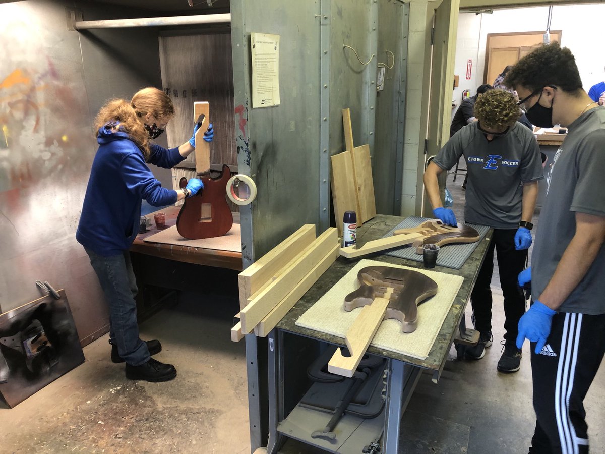 EAHSTech_Ed's tweet photo. Several of the EAHS students have completed burst patterns on their guitars. They named them Black Cherry Burst and Black Grape Burst. The red was straight dye from the bottle. But the purple was custom mixed for this application. Now it is time for them to build the gloss coat. https://t.co/TRXkix4ZDM