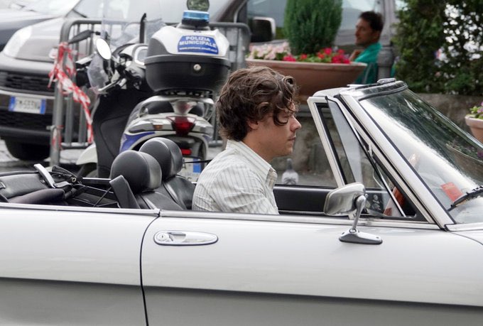 7. harry was finally seen on set! sporting some serious james bond vibes with his vintage alfa romeo and a lamborghini speedboat!! TALENTED KING