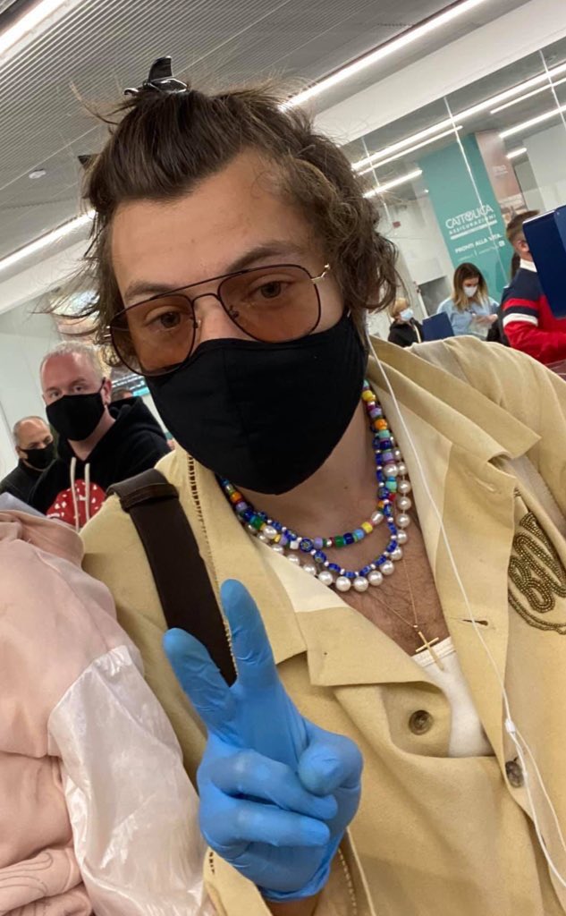 1. harry was spotted at the naples airport and fans speculated that it was a layover to LA where he would shoot the dwd film, but we were all proven wrong... THE NECKLACE STACK AAA