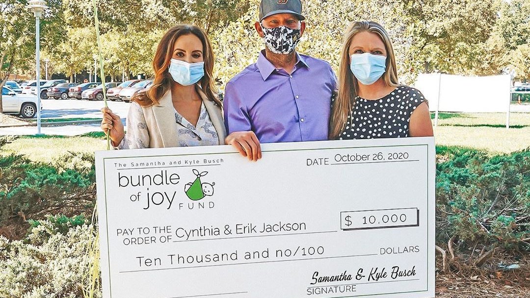 We know there's nothing but smiles behind those masks! A surprise donation from <a href="/bundleofjoyfund/">The Bundle of Joy Fund</a> will help this couple start their journey to become parents. We want to send a special thank you to <a href="/SamanthaBusch/">Samantha Busch</a> for helping us surprise one of our Novant Health team members.