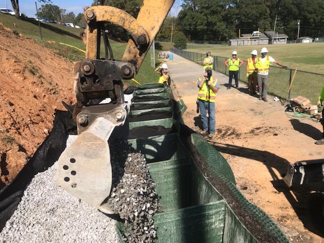 CHAPublicWorks's tweet photo. #CHAPublicWorks are working on slope repairs at the Hixson Youth Athletic Association using a new product. The vendor donated the materials &amp; provided training to our crews. https://t.co/ftbs47yZeo