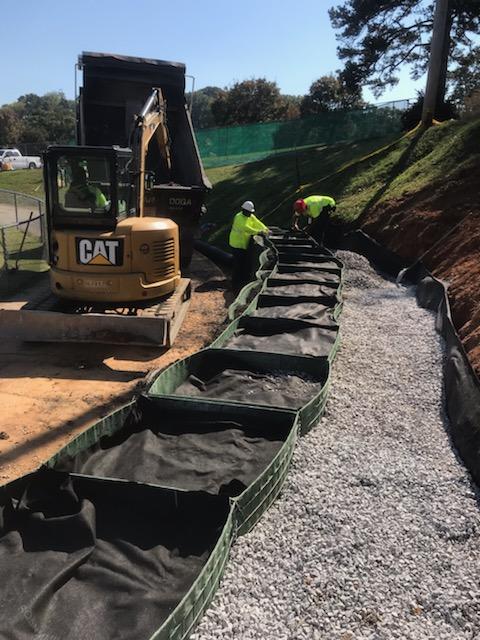 CHAPublicWorks's tweet photo. #CHAPublicWorks are working on slope repairs at the Hixson Youth Athletic Association using a new product. The vendor donated the materials &amp; provided training to our crews. https://t.co/ftbs47yZeo