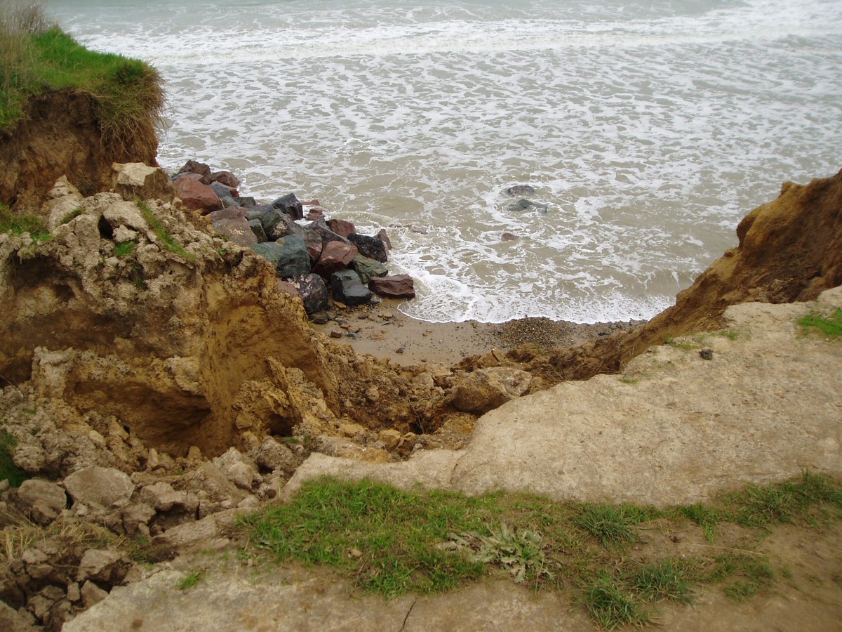 NorthNorfolkDC's tweet photo. CLIFF WARNING: We have had to temporarily close Happisburgh Ramp to the public following erosion after  recent storms. We ask that you don't use the ramp while our Coastal team monitor the area. 
Contact coastal.management@north-norfolk.gov.uk to report any further cliff activity https://t.co/ddOkE71teQ