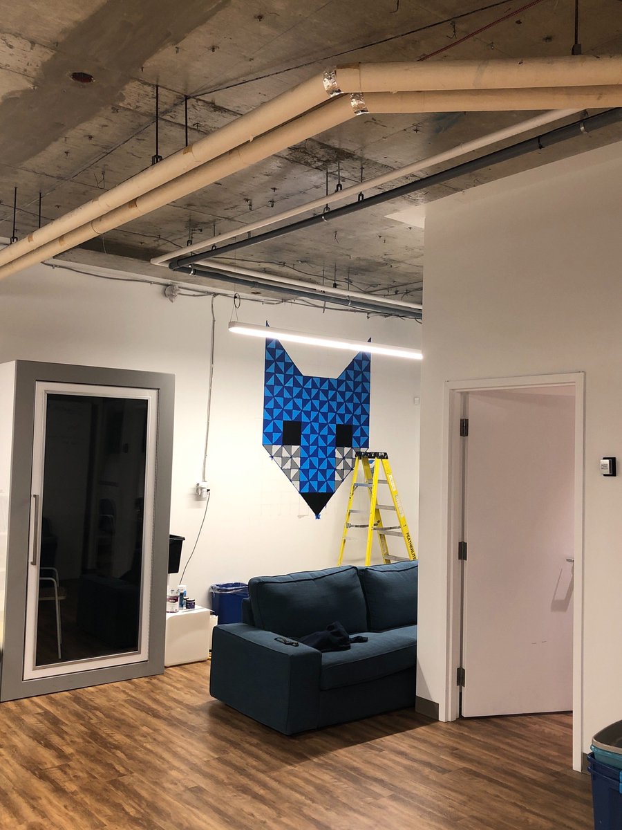 FoxquiltDen's tweet photo. Here's the big reveal of the #mural we showed you a sneak peek π¦ It needs some final touches but we already can't believe how awesome it looks! Our team members, Bobbie & Kassa, did such an incredible job while keeping a safe distance from each other too. #foxquilt #officestyle https://t.co/NYqnnJdIQ2