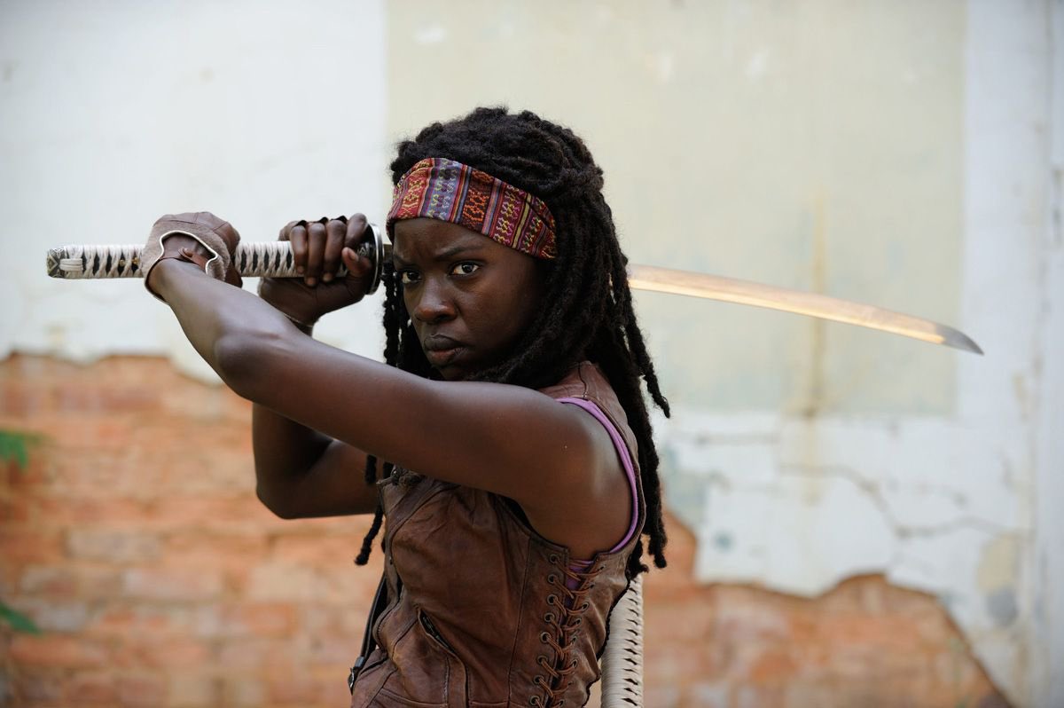 Danai Gurira as MichonneA lone wolf with a protective outer shell. Burdened by her past, but turned hopeful for her future. A brilliant & masterful leader that cares deeply for her people and fights hard for them. A mama bear. A lover. A groundbreaker. This is Michonne.