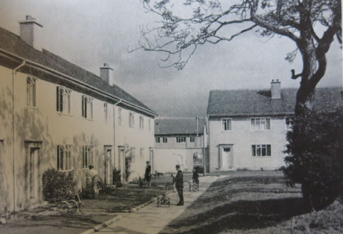2/ Most of the photographs depict the varied housing of the New Towns; on the left, a 'detached managerial-type house' in Glenrothes; to the right, flats and houses in Crawley and terrace houses in East Kilbride.
