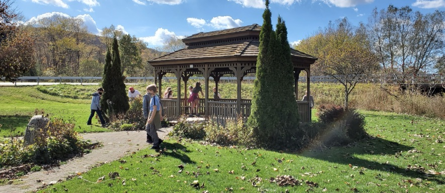 Some of our 5th graders enjoyed the warmer weather last week during a social studies lesson... geocache exploration!