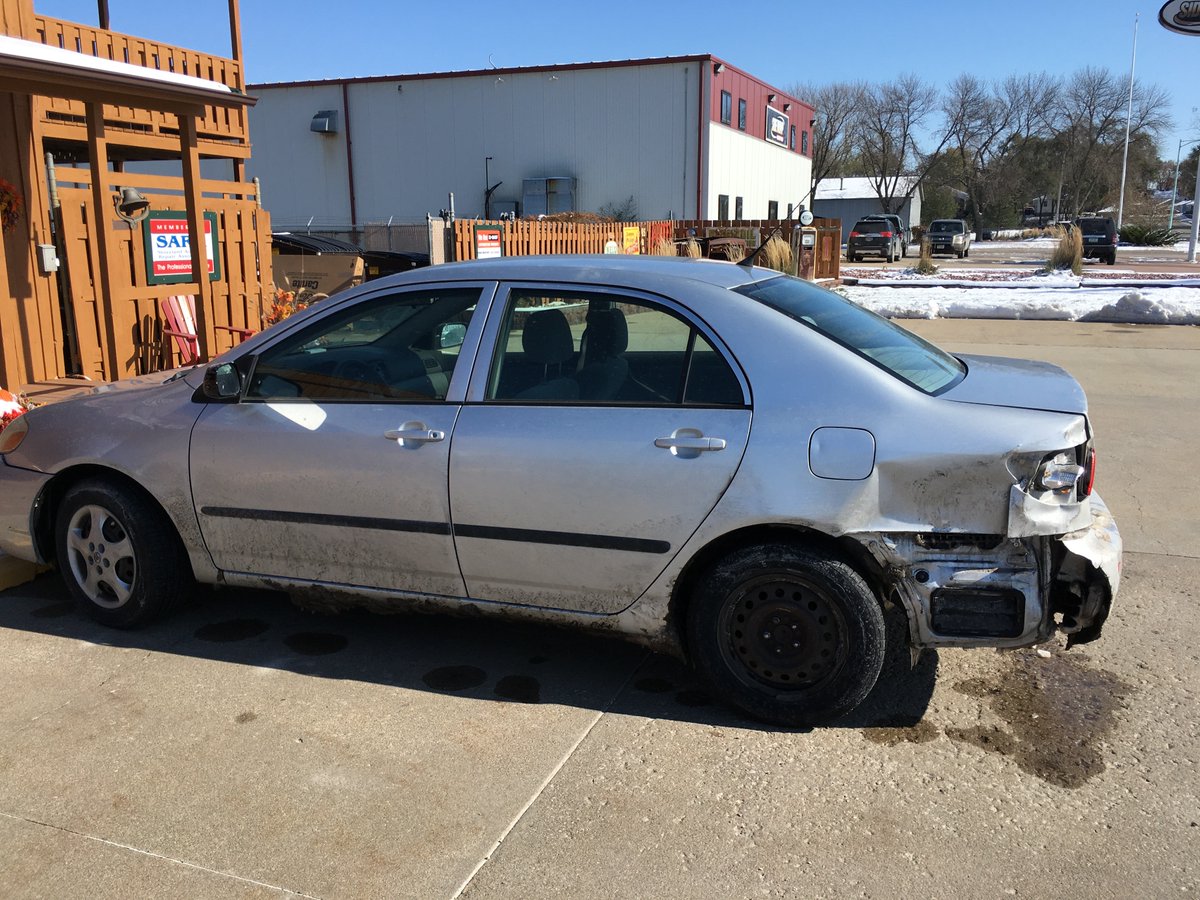 Picture of my car with the wrecked back quarter