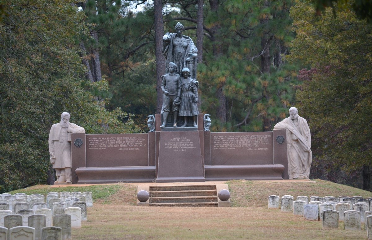 andeNHS's tweet photo. The Illinois monument erected in Andersonville National Cemetery is powerful. Among other interpretations, one might say Columbia stands pointing toward soldier's graves, instructing two children that this tragedy cannot happen again. https://t.co/Qlt6dhS1L2