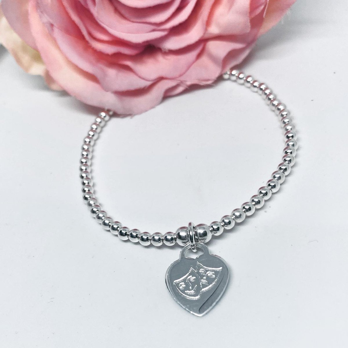 nerysgjewellery's tweet photo. 🌸Custom order🌸 Engraved sterling silver heart charm on 3mm beads with #Drama #theatre 🎭 masks on one side and name on the other
#sterlingsilverjewelry #sterlingsilverjewellery #silver #bracelets #theatre #dramamasks #jewellery #charmbracelet #stackingbracelets #jewellery https://t.co/R2RNs07iqi