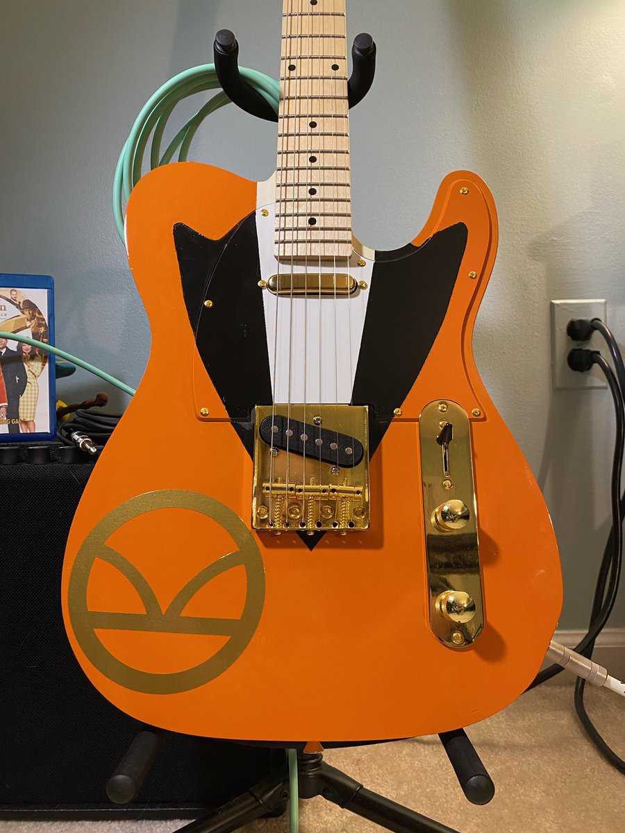 realtorsheehan's tweet photo. My daughter made this custom guitar for @TaronEgerton.  She’s a huge @KingsmanMovie fan. Now we have to figure out how to get it to him. 🤪 HELP! https://t.co/VYLq5LuR8f
