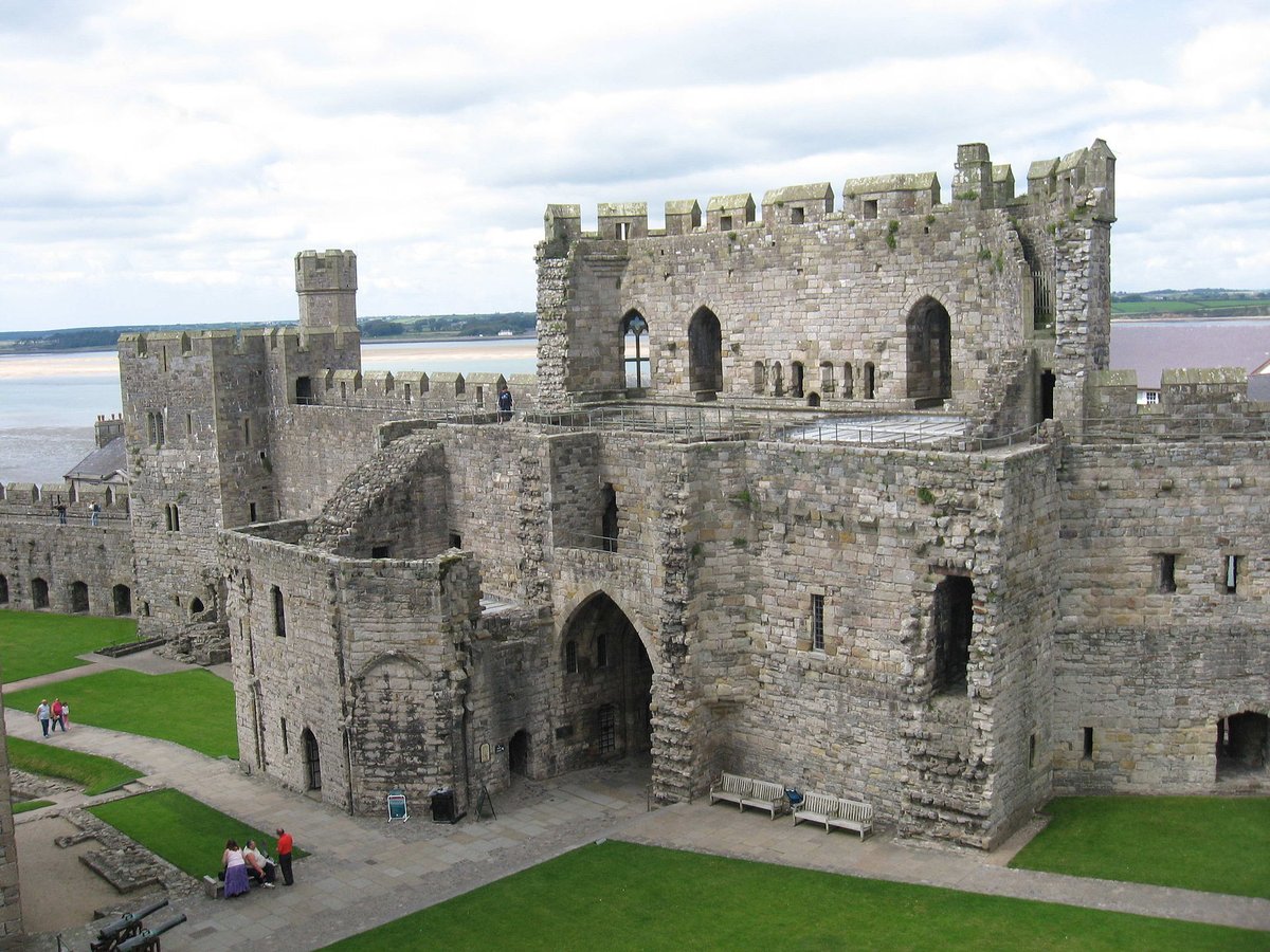 Round 2, Bracket E!Tintagel Castle vs Caernarfon CastleHistorians agree that Edward was trying to make a point about his legitimacy by building unusual polygonal towers at Caernarfon, but they can't agree if it's meant to be a Roman or Arthurian reference.