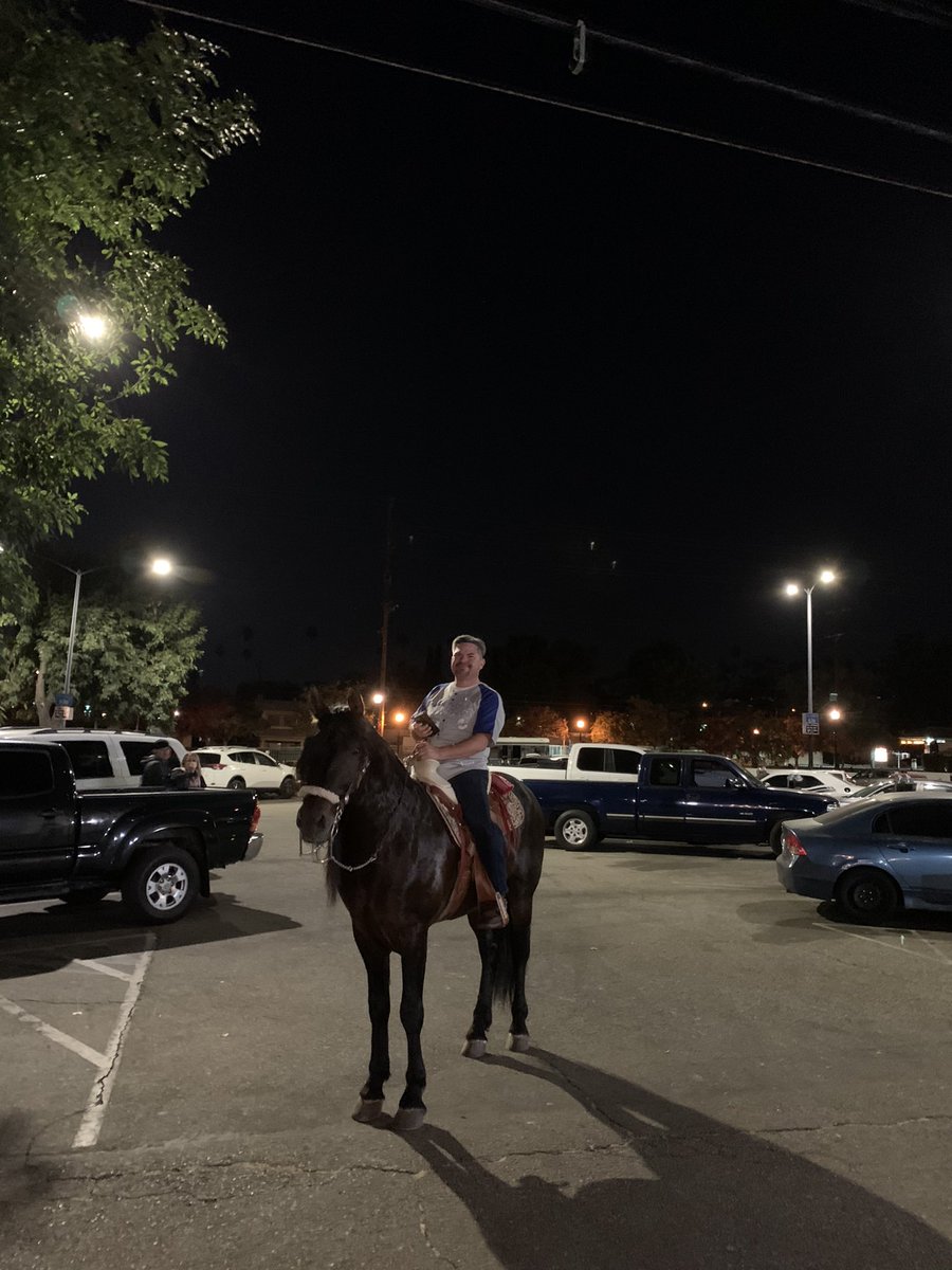 theglutster's tweet photo. A lone Dodger vaquero enjoying the World Series win in a parking lot behind Figueroa Street in Northeast L.A. Ain’t nowhere else in the damn world like Los Angeles, I swear. #keephighlandparkpaisa https://t.co/XOHFLYOXGX
