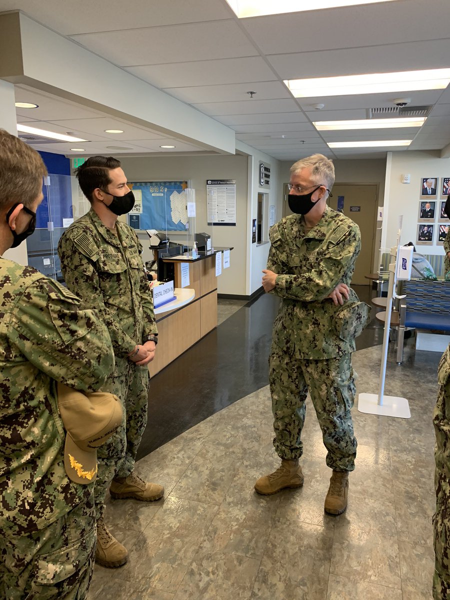 During a tour of the Naval Health Clinic/NMRTC Lemoore dental clinic, Rear Adm. Tim Weber, NMFP commander, met Hospital Corpsman 3rd Class Justin Prothero who served aboard USNS Mercy during the recent DSCA mission, supporting the DoD’s COVID-19 response efforts.