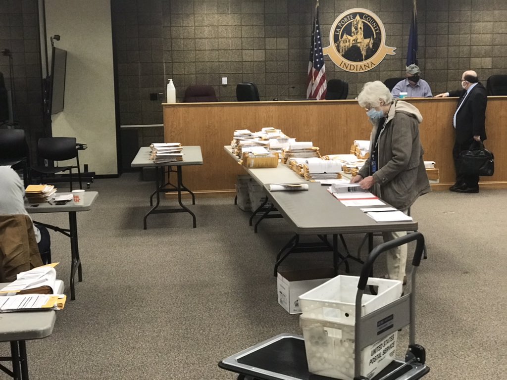 The ballots on the small left hand table are the last ones to still need verified. There are currently eight different tables doing the verifying right now. Processing ballots has also begun.