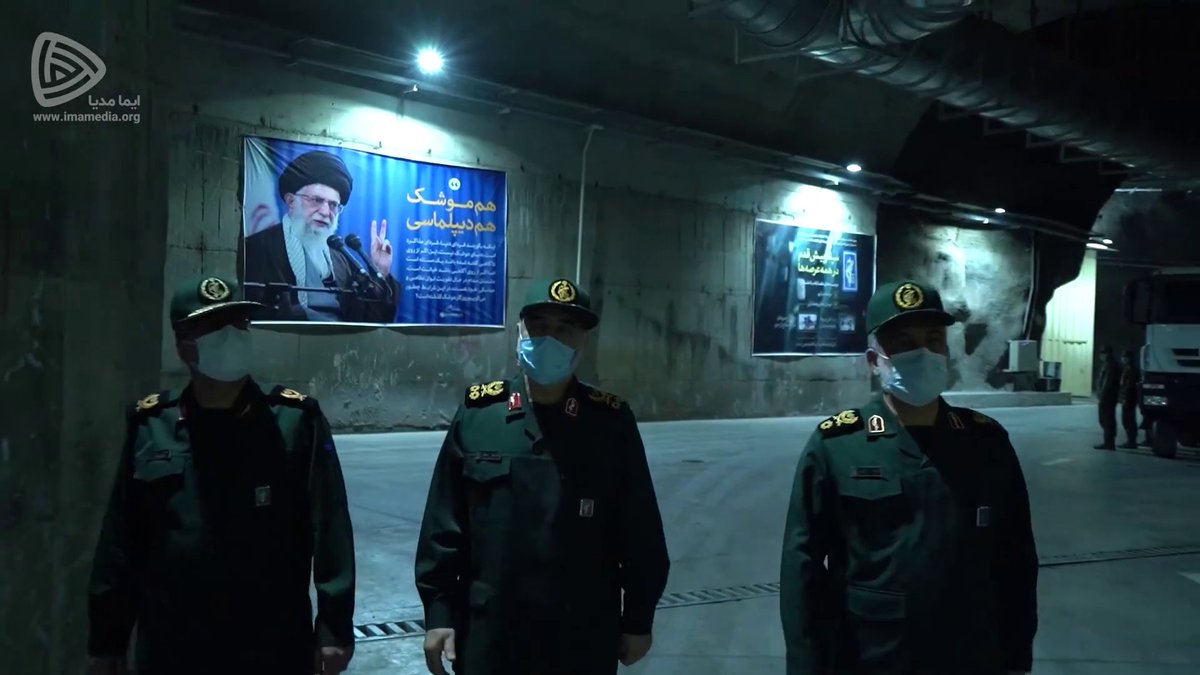 Thread on the billboards and PR materials seen in the new Iranian missile base footage which give you a good insight into both IRGC ideology and narratives. "Both Missiles and Diplomacy" billboard featuring Khamenei.