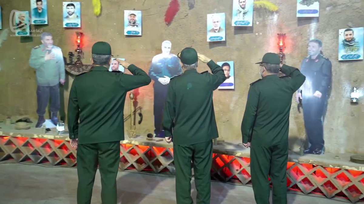 Cardboard cutouts of Tehrani Moghaddam, Qasem Soleimani and Ahmad Kazemi at a Martyrs' shrine inside the facility.