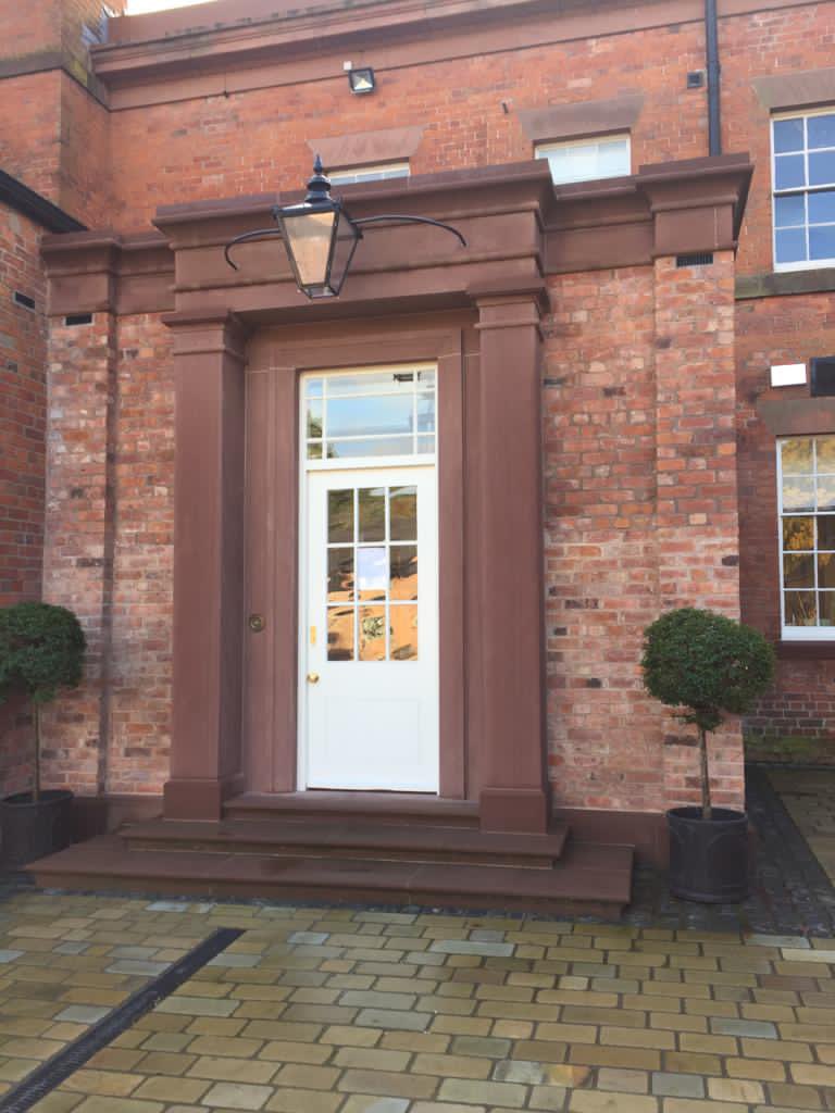New St Bees red sandstone door surround at a private residence manufactured and fitted by Mather &amp; Ellis. #stonemasons